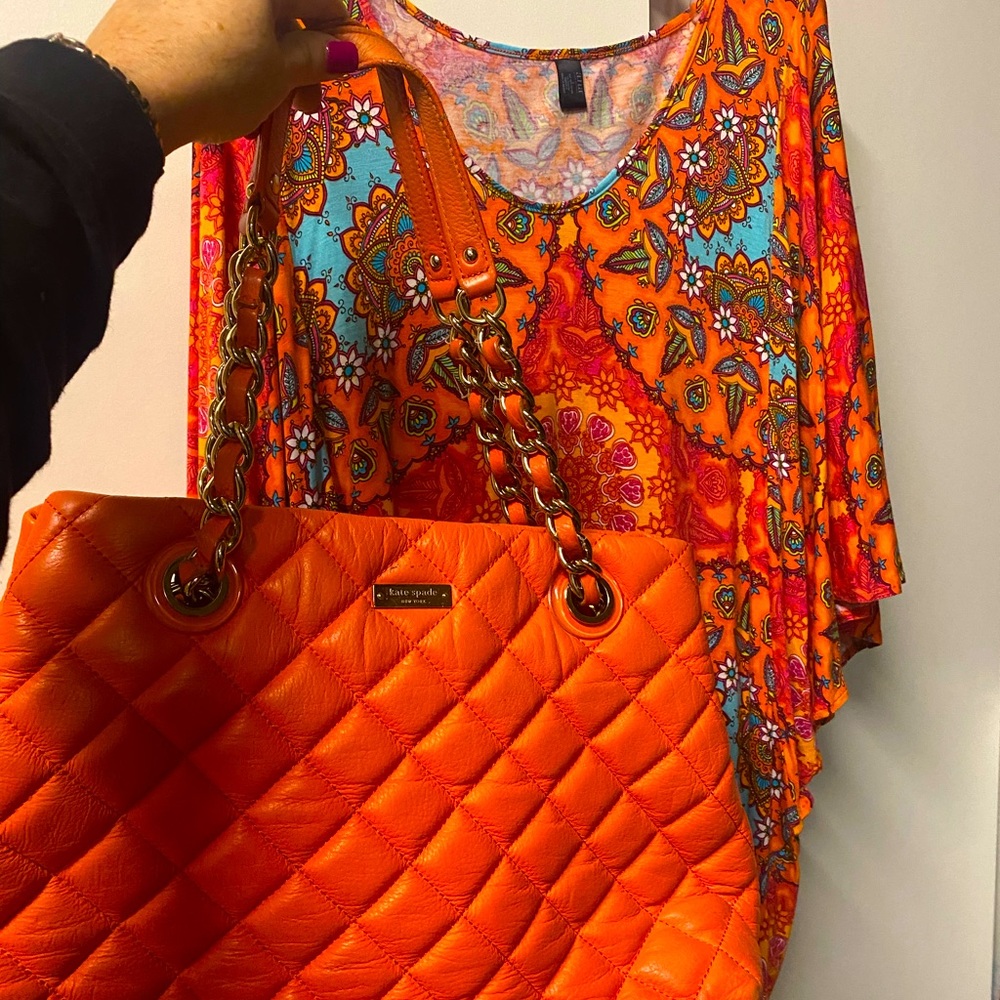 Colorful size L shirt or can be used as a coverup.